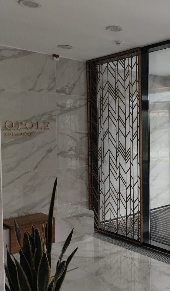 Декоративные панели из металла на фасаде ЖК Metropole в Алматы